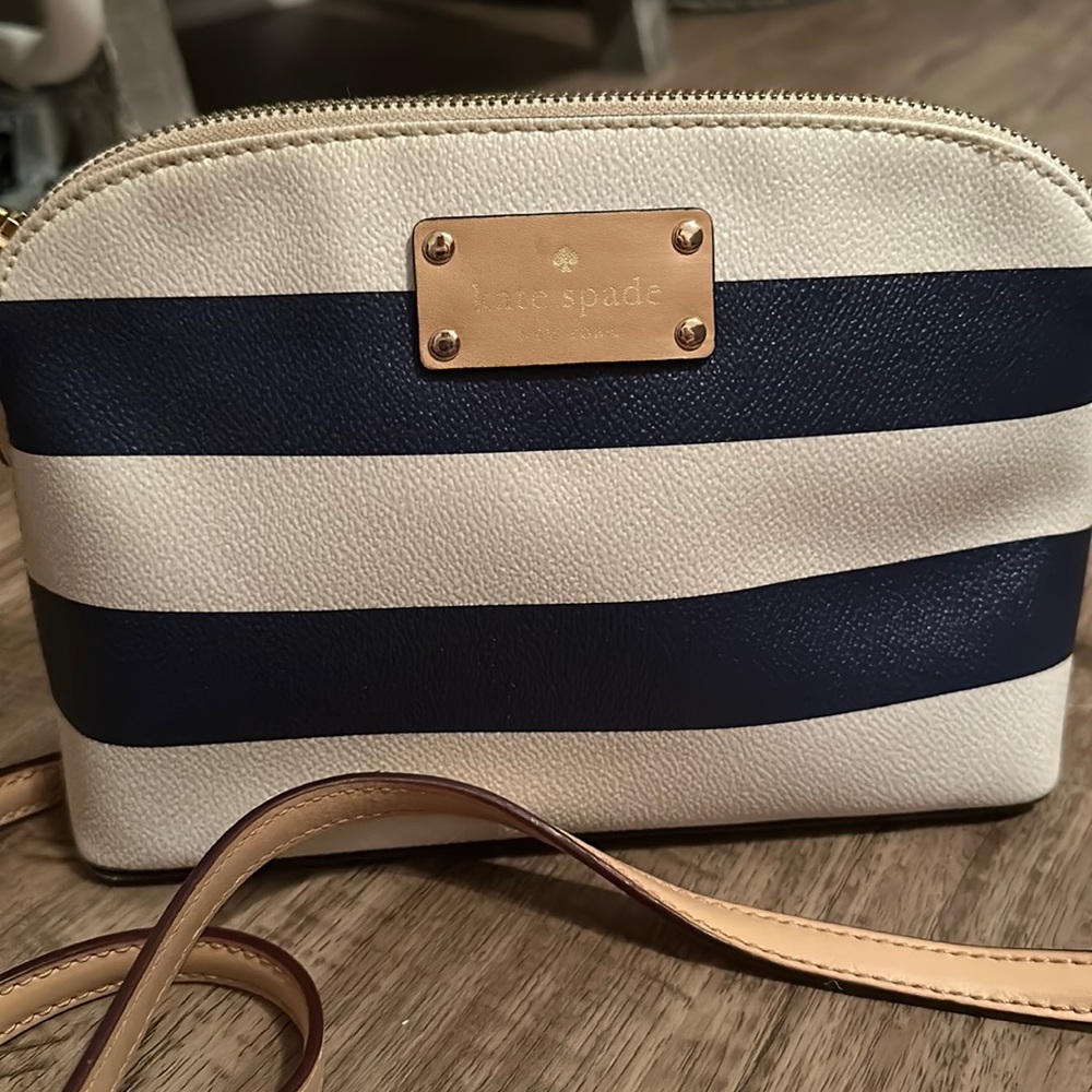 Navy and white striped, Kate Spade crossbody bag.
